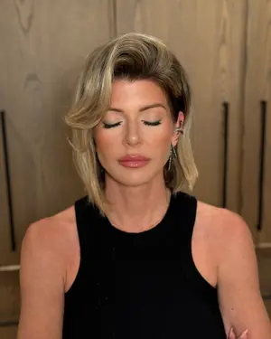 Short blonde bob with soft smoky eyes and a nude lip